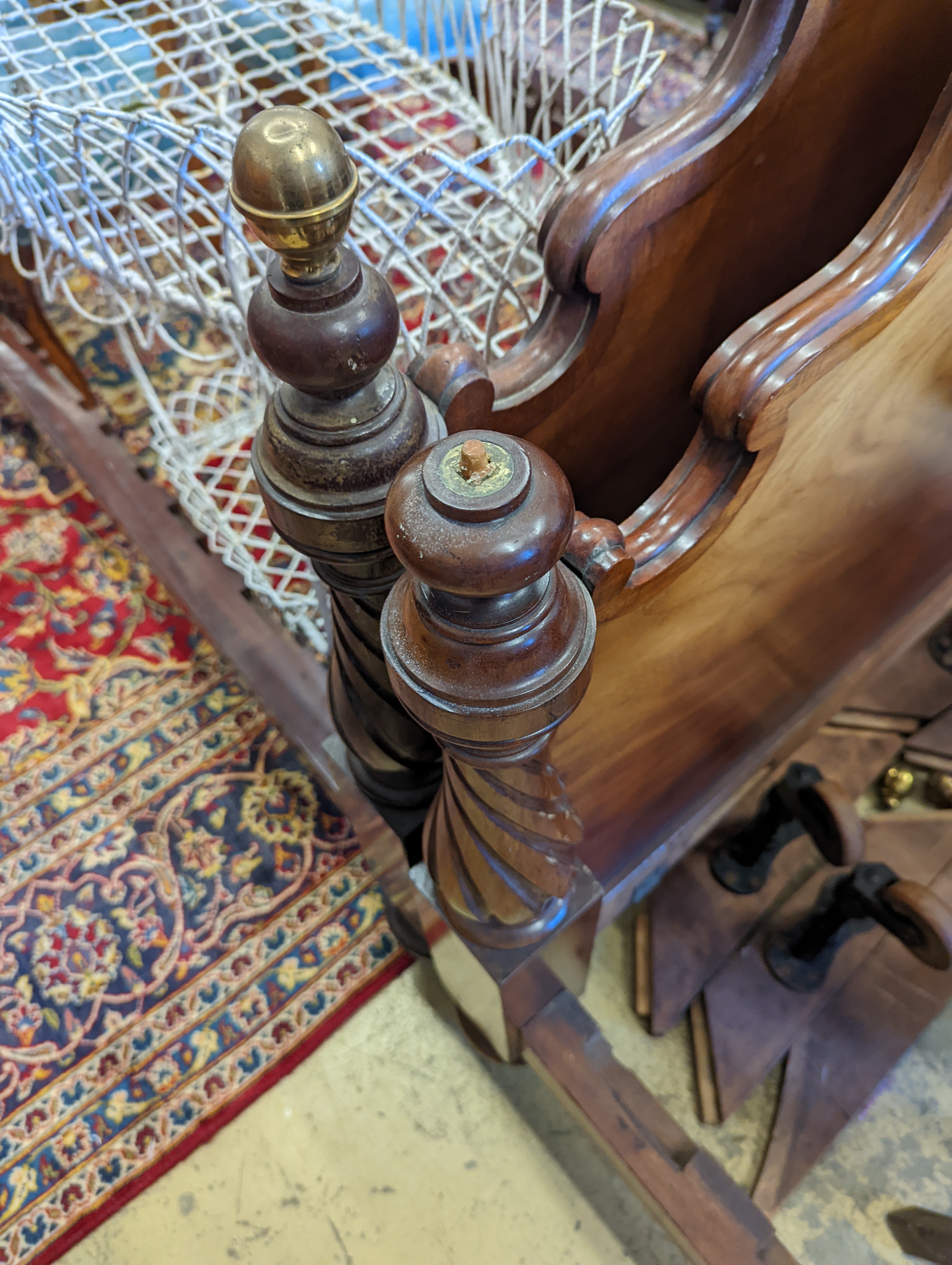 A pair of Victorian mahogany single bed frames, length 210cm, width 107cm